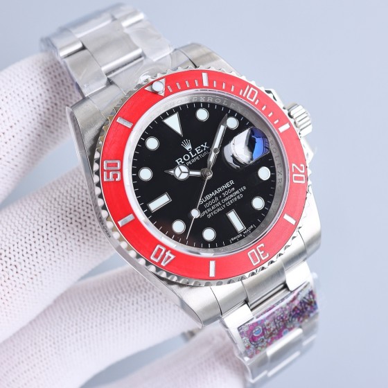 Rolex Submariner series, black dial, red bezel, 41mm, silver Oyster bracelet.